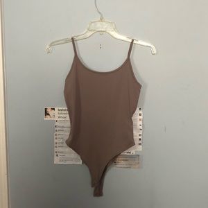 beige bodysuit